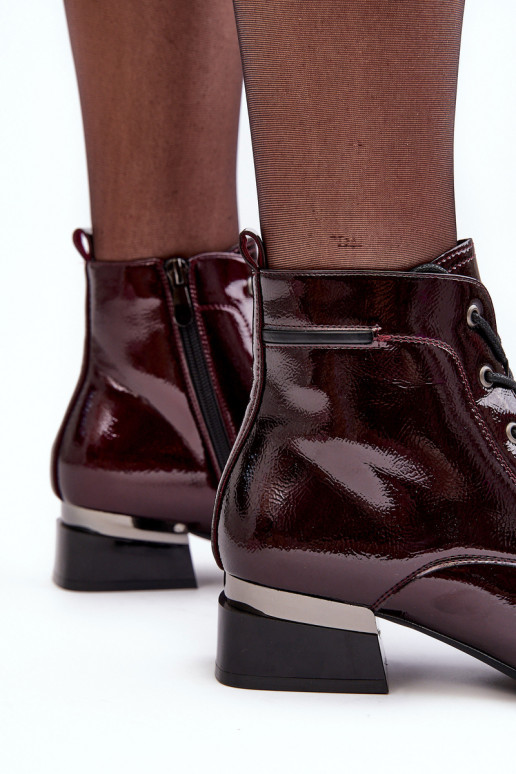 Maroon patent store boots