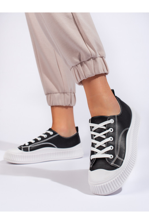 Black classic model women's sneakers from eco leather