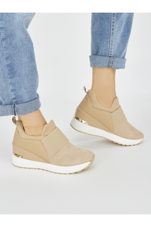 Brown color of suede Sneakers on a wedge