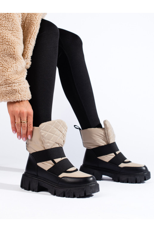 Women's snow boots on a thick platform beige black