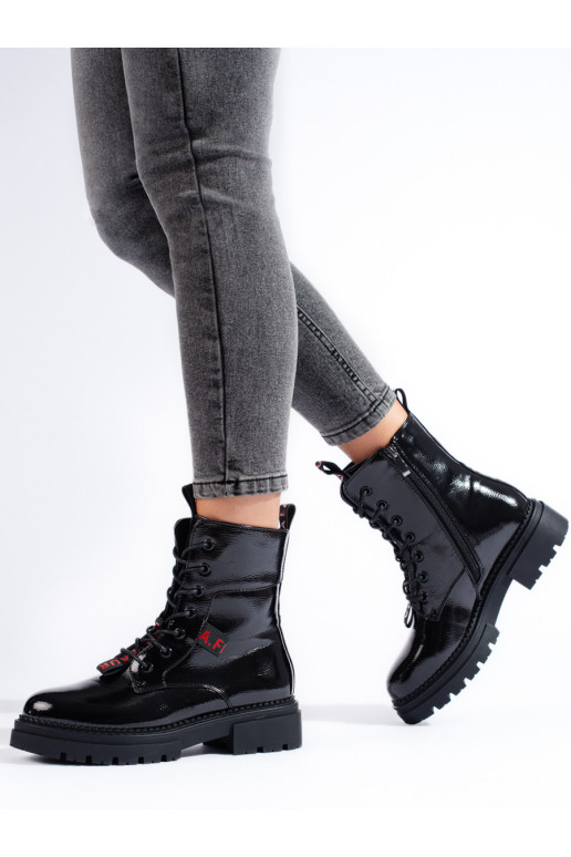 Women's boots black made of patent ecological leather