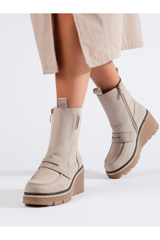 cream colors Chelsea boots of suede boots on a wedge