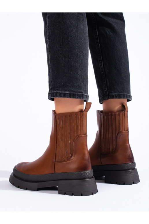 Brown color Chelsea boots on a thick sole