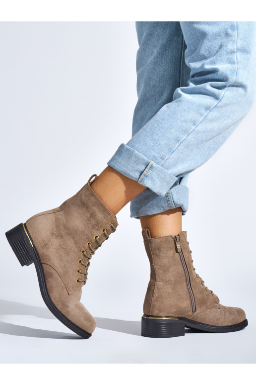 beige women's boots laced on a low heel