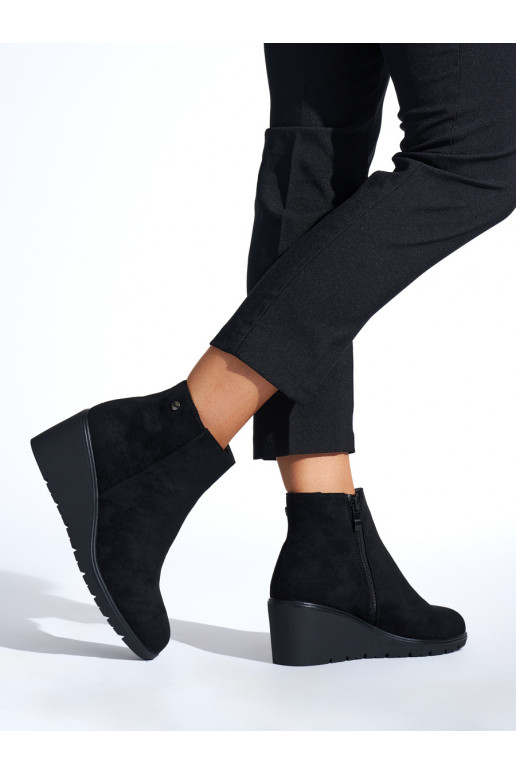 black boots on a wedge