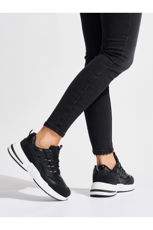 black womens sneakers on a thick sole