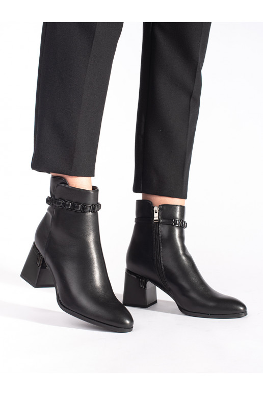 black elegant women's boots on the heel