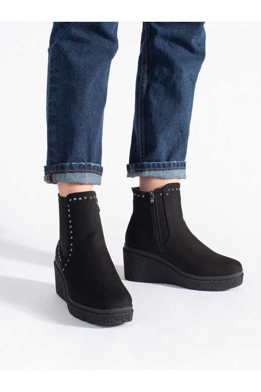 of suede black boots on a wedge