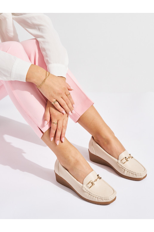 beige women's moccasins with buckles