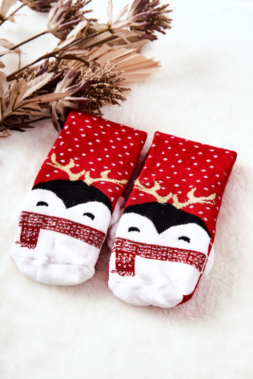 Socks with penguins in red color