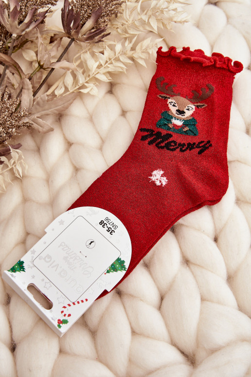 Shiny Christmas stockings with deer in red color