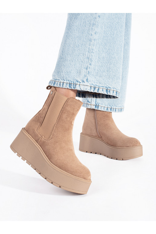 beige of suede Chelsea boots on a wedge