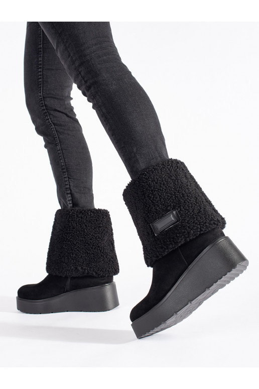 black insulated women's boots on a wedge