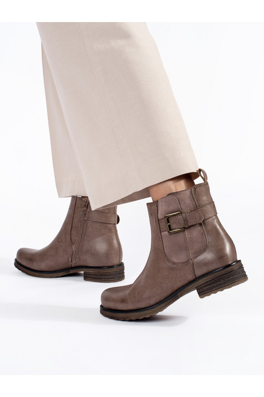 Brown color women's boots on a low heel