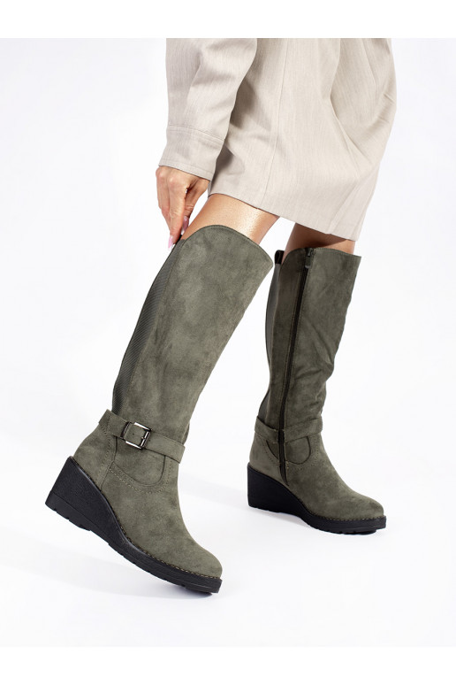 of suede darkgreen long boots on a wedge