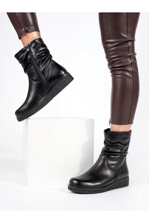 black leather women's boots on a low wedge with a ruffled upper Sergio Leone