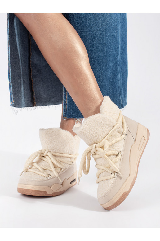 beige Women's snow boots on a thick sole