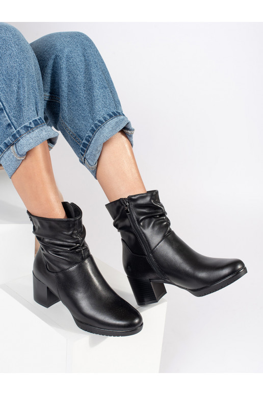 black leather women's boots on the heel with a ruffled upper Sergio Leone