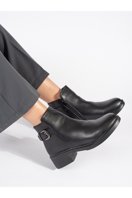 black women's boots on a low heel with a decorative buckle