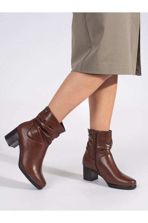 Brown color leather women's boots on the heel with a ruffled upper Sergio Leone