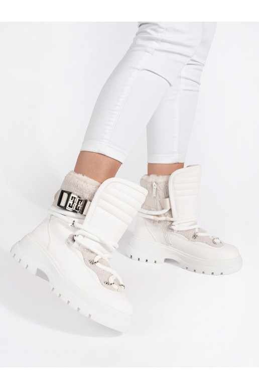 White color Women's snow boots with fur on a thick sole