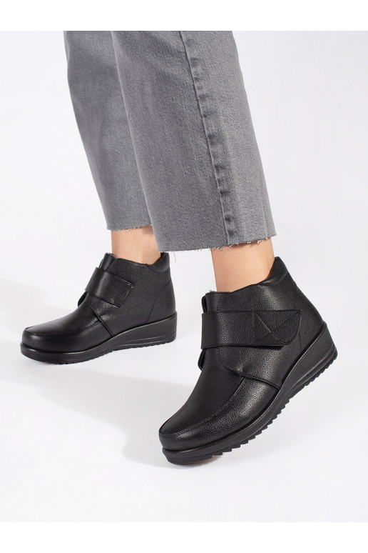 black insulated women's boots on a wedge