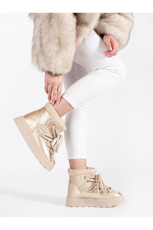 ivory laced Women's snow boots on a thick sole