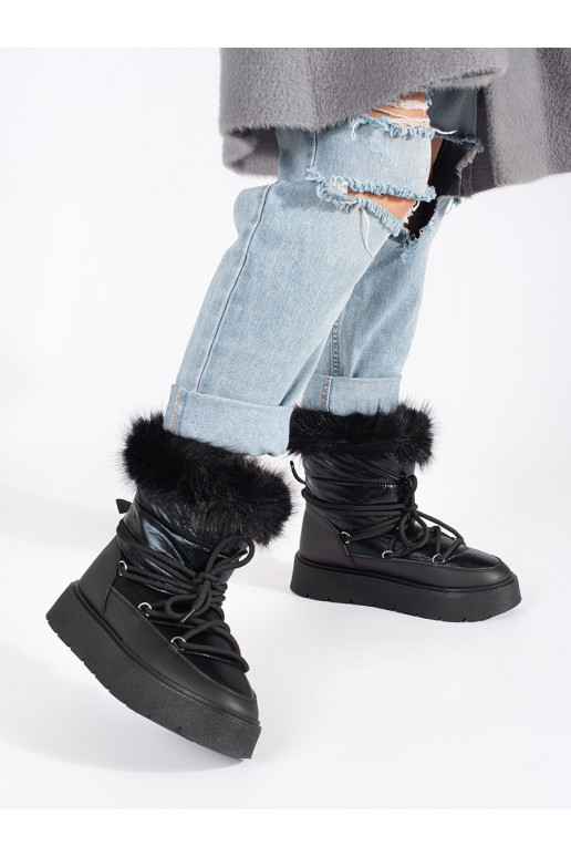 black Women's snow boots with fur on a thick sole