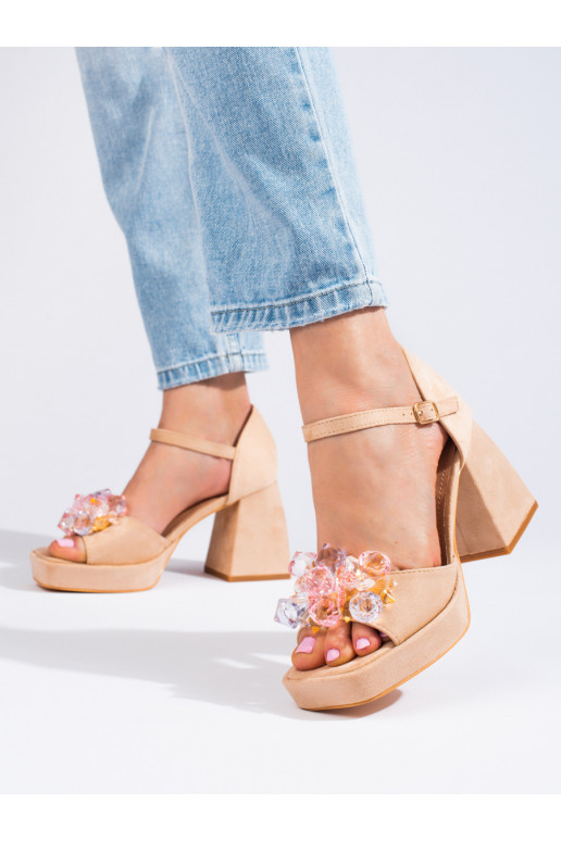 beige sandals on the heel with stones