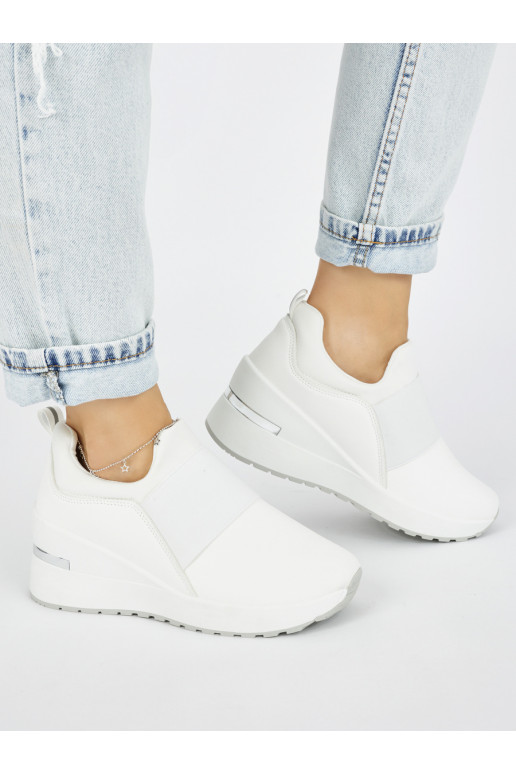 White color Sneakers model shoes on a wedge