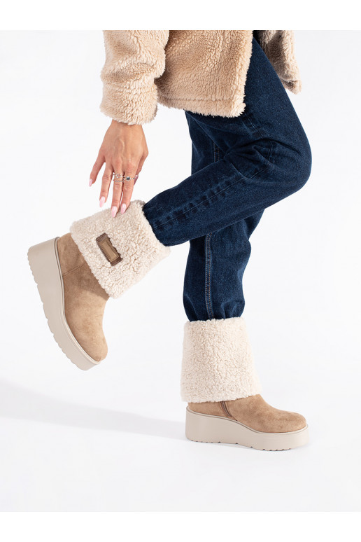 beige insulated women's boots on a wedge