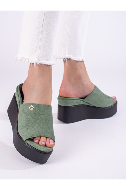 Slippers on a high wedge green