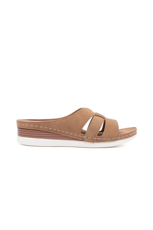 Comfortable slippers on a low wedge beige