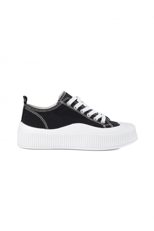 Black and-white color Sneakers on a thick sole